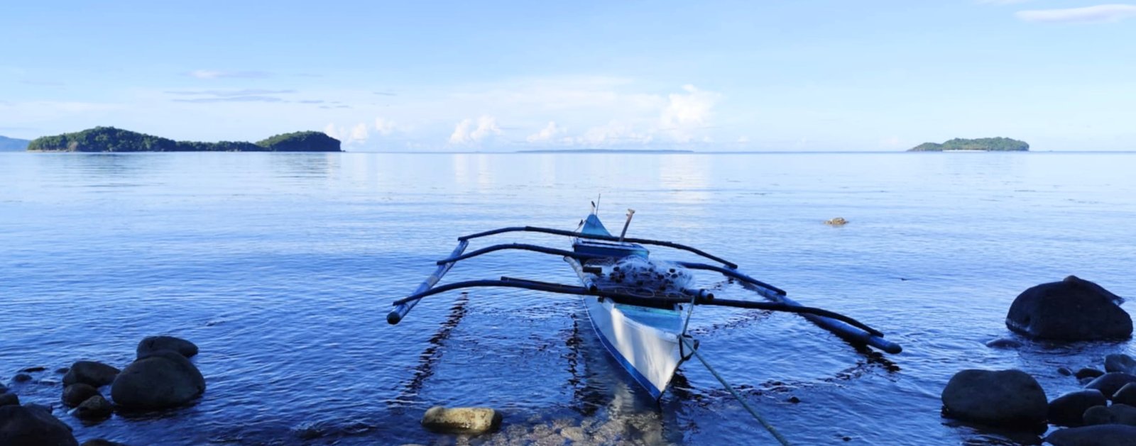Traditional bangka boat on the shore of Biliran, Philippines, symbol of authentic travel and island immersion.